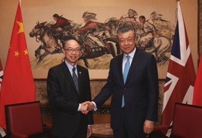 The Secretary for Transport and Housing and Chairman of the Hong Kong Maritime and Port  Board, Mr Frank Chan Fan (left) meets with the Chinese Ambassor, Liu Xioming in UK in a courtesy call.