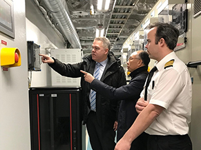 The delegation of the Hong Kong Maritime and Port  Board led by the Secretary for Transport and Housing, Mr Frank Chan Fan, visited Bergen, Norway, for the last leg of their Nordic tour today (March 15, Bergen time). Photo shows Mr Chan (centre) being briefed on the facilities on an environmental friendly ferry.